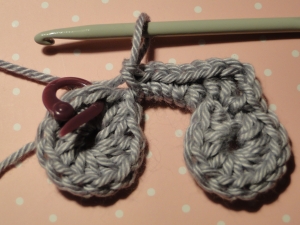 We've crocheted around the crossbar back to the front wheel