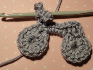 The handlebars are crocheted with chains and slip stitches