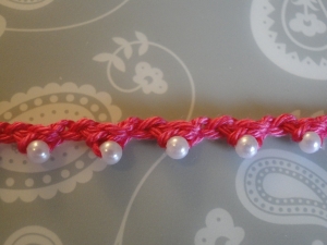 pink braid with pearly beads pink braid with pearly beads