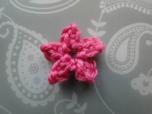 The completed pink flower