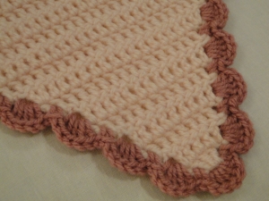 The bottom stitches of the blankie.