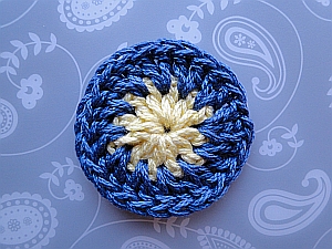 Round 2 finished - a yellow circle surrounded by dark blue.