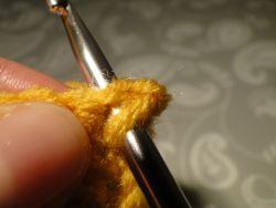 Inserting hook into stitch