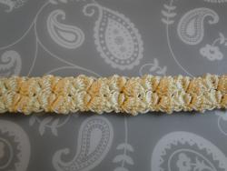 two bobbles worked one row above the other two bobbles worked one row above the other