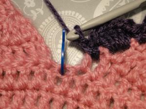 Working the center stitch at the top Working the center stitch at the top