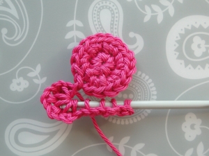 Pulling hook through loops for petal