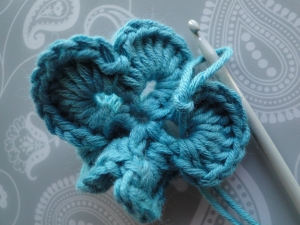 Final slip stitch of flower