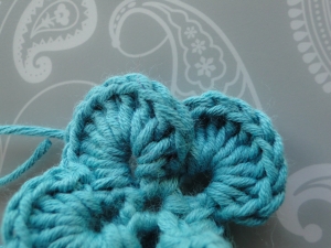 Laying each petal a little under the next one