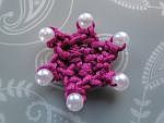Pink star with six pearly picots