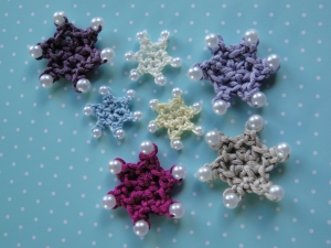 tiny star shapes with beaded petals