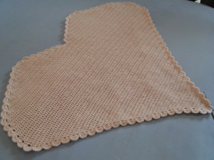 A plain heart blanket, crocheted in one color only.