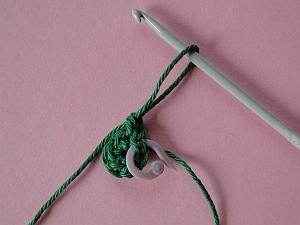 Crochet hook pulling up long loop Crochet hook pulling up long loop