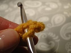 Hook under 2 loops of chain Hook under 2 loops of chain