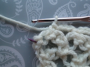 An extra stitch at the end, stitch marked