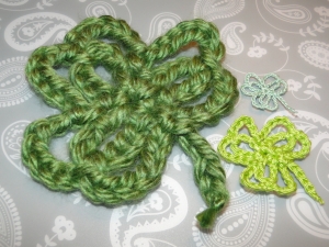 three shamrocks in three different yarn weights